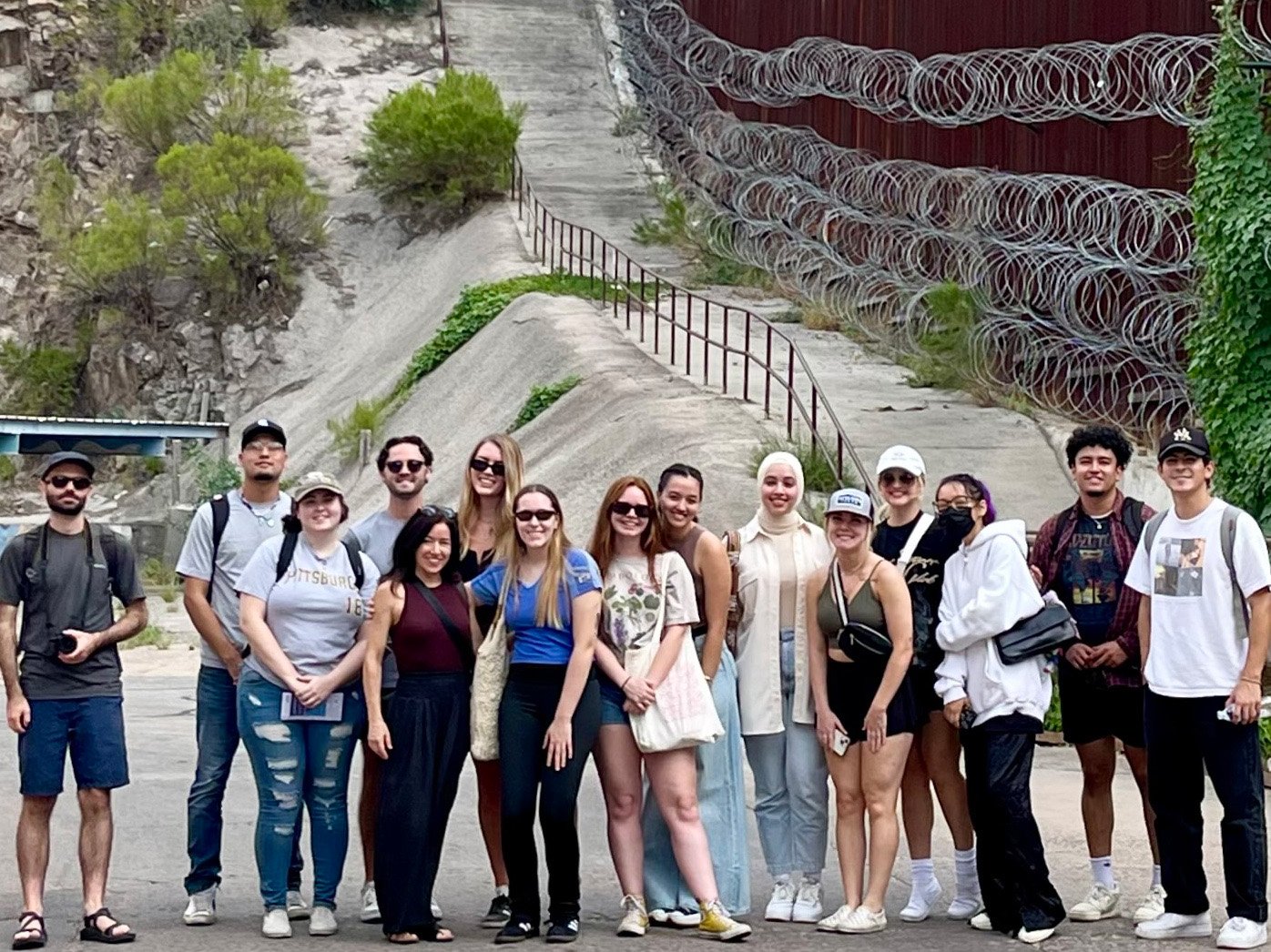 Border studio smiling for photo